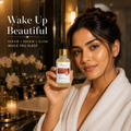 A woman in a white robe holds a bottle of Pivotal Beauty Wake Up Beauty Serum in a warm, luxurious bathroom setting. The image includes promotional text on the left reading 'Wake Up Beautiful' and 'REPAIR • RENEW • GLOW WHILE YOU SLEEP'.