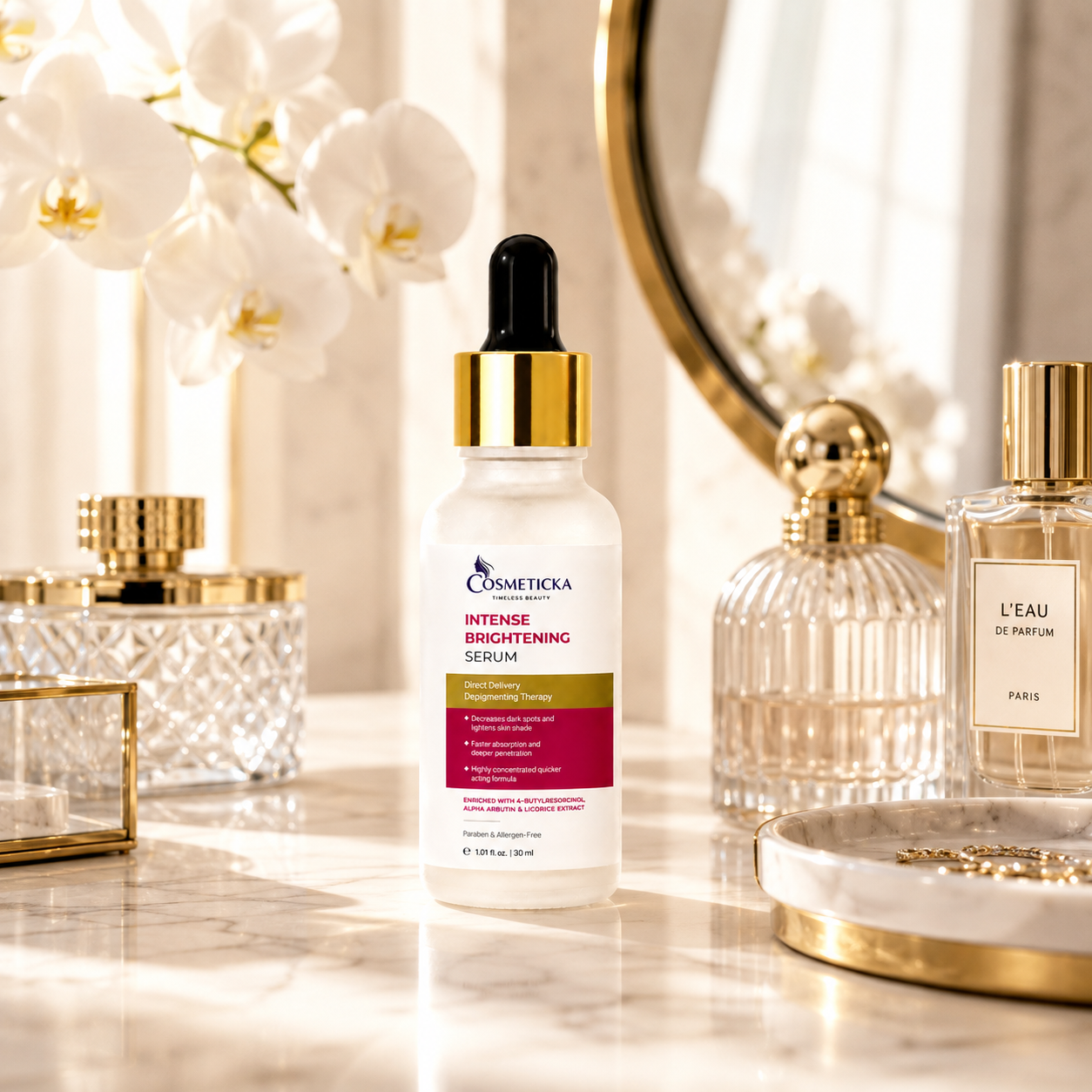 Cosmetica Intense Brightening Serum in a frosted glass bottle with a gold collar and black dropper cap, styled on a marble surface with perfume bottles and white orchids in the background.